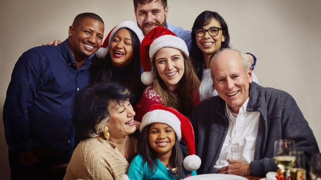 Portrait of a multi generational family celebrating Christmas together at home